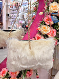 Cartera peluche blanca 🤍