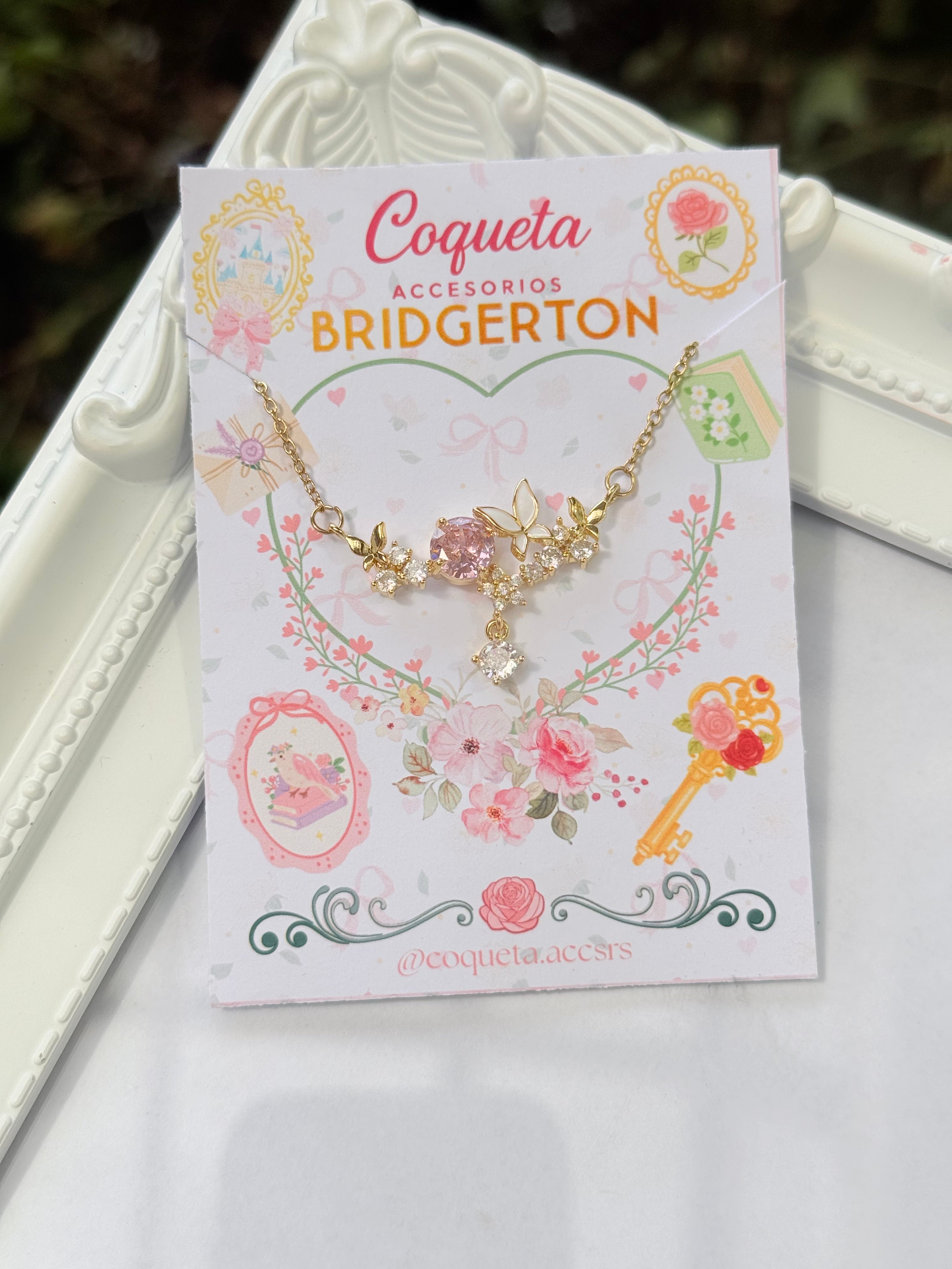Cadena colección bridgertone mariposa con zirconia rosa