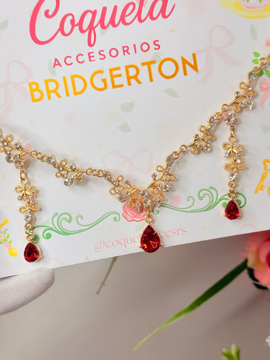 Juego aros + collar bridgerton dorado con gema roja