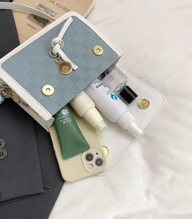 SOLO VENTA ONLINE minibag con moño 🎀🩵